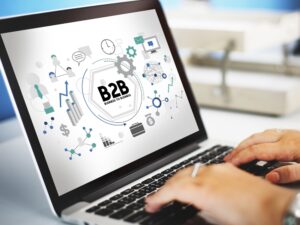 B2B e ícones na tela de um laptop.